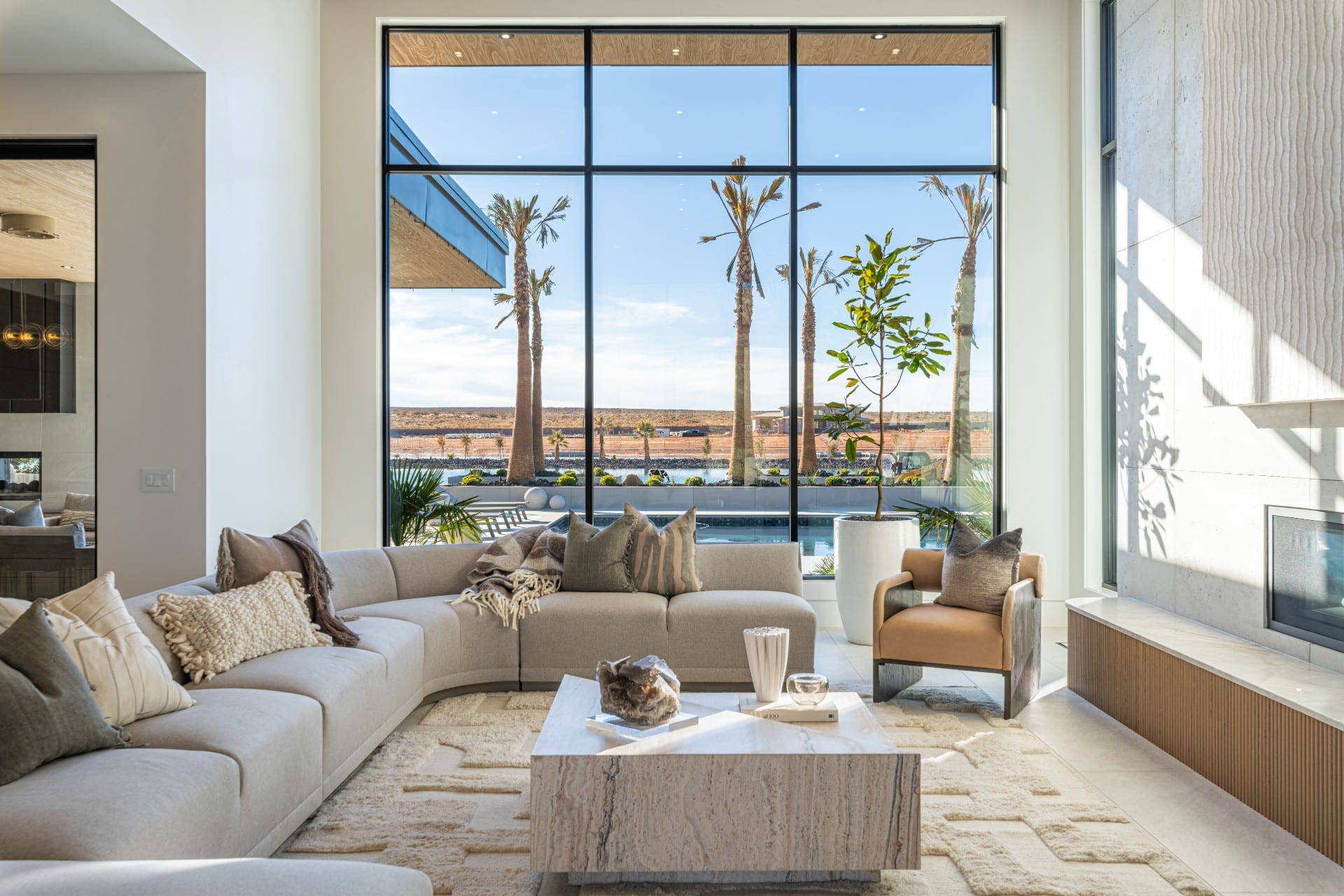 Great room with multi-slide glass to the lake