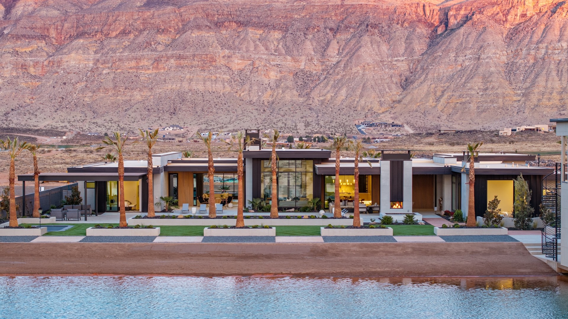 Aerial view of the Lake House at Southern Shores against red mountains